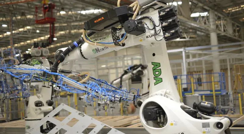 A KUKA robot on 5North’s panel line at its Edinburgh, South Australia factory, working over a timber frame — photo: 5North